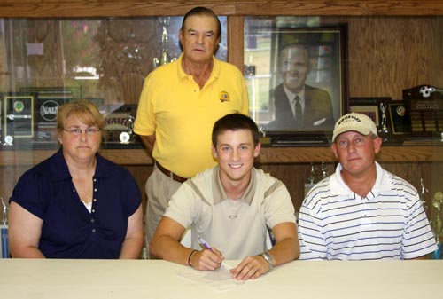 Kyle Webb is joined by his parents Larry, Jr. and Laura Webb with Men's Golf Coach Dr. Jerry Wilcoxson
